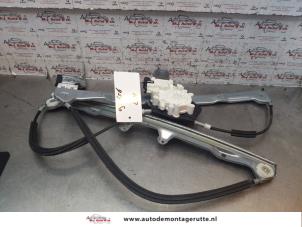 O148304 Gebruikte raammechaniek 4deurs links-voor Mitsubishi Colt