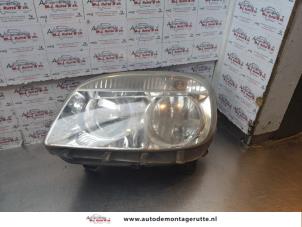 O148320 Gebruikte linker koplamp Fiat Doblo