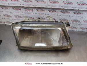 O148694 Gebruikte koplamp rechts Saab 900