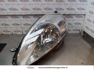 O148697 Gebruikte linker koplamp Fiat Punto Grande