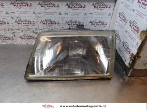 O148772 Gebruikte linker koplamp Peugeot 205