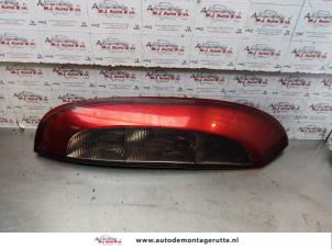 O148885 Gebruikte achterlicht links Opel Corsa