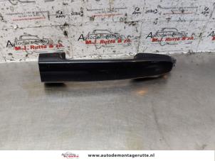 O148994 Gebruikte portiergreep 4deurs links-voor Toyota Yaris