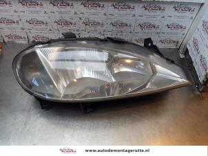 O149609 Gebruikte rechter koplamp Renault Megane