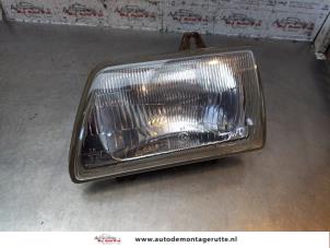 O149656 Gebruikte koplamp links Suzuki Alto