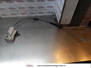 O149694 Gebruikte slotmechaniek portier 2deurs links Ford KA