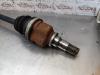Gebruikte Aandrijfas links-voor Toyota Yaris O149928