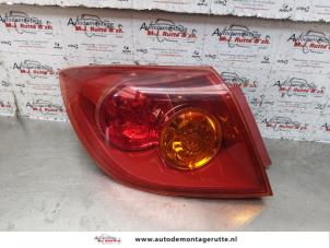 O150063 Gebruikte achterlicht links Mazda 3.