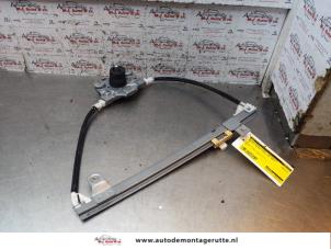 O150398 Gebruikte ruitmechaniek 4deurs links-achter Renault Megane Scenic