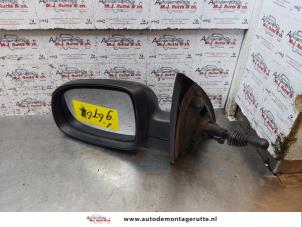 O150438 Gebruikte buitenspiegel links Opel Corsa