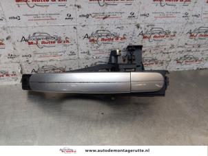 O150464 Gebruikte portiergreep 4deurs links-achter Ford Focus