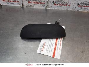 O150470 Gebruikte portiergreep 2deurs links Nissan Micra