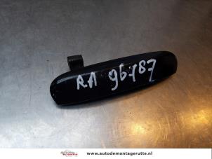 O150561 Gebruikte portiergreep 4deurs rechts-achter Mitsubishi Colt