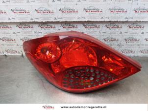 O150618 Gebruikte achterlicht links Peugeot 207