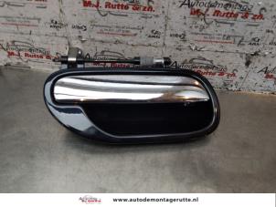 O150667 Gebruikte portiergreep 4deurs rechts-achter Volvo S40
