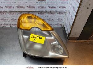 O150852 Gebruikte rechter koplamp Renault Modus