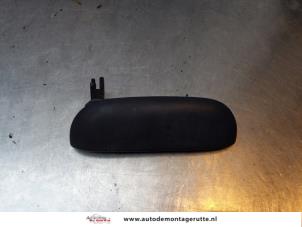 O150877 Gebruikte deurgreep 4deurs rechts-voor Nissan Micra