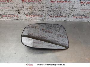 Gebruikte Spiegelglas links Opel Tigra Twin Top 1.4 16V Prijs op aanvraag aangeboden door Autodemontage M.J. Rutte B.V.