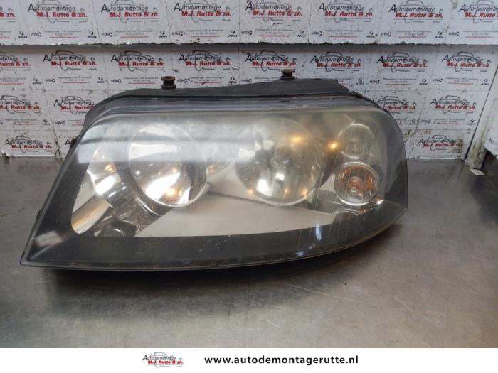 Linker Koplamp van een Seat Alhambra (7V8/9) 2.0 2003