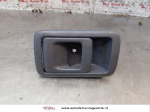 O152106 Gebruikte portiergreep 4deurs links-achter Toyota Landcruiser