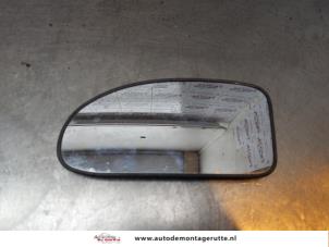 Gebruikte Spiegelglas links Ford Focus 1 Wagon 1.6 16V Prijs op aanvraag aangeboden door Autodemontage M.J. Rutte B.V.