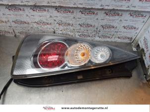 O152912 Gebruikte achterlicht links Mazda 5.