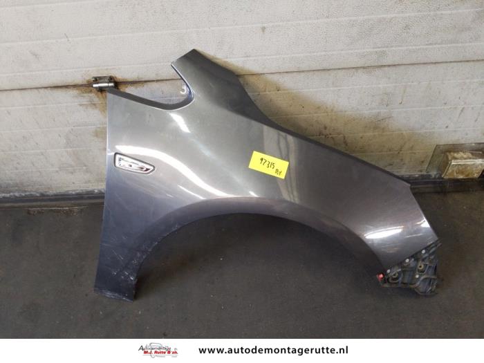 Spatbord rechts-voor van een Opel Astra J Sports Tourer (PD8/PE8/PF8) 1.4 16V ecoFLEX 2011