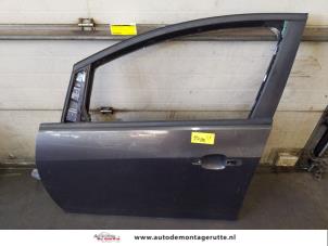 O152942 Gebruikte portier 4deurs links-voor Opel Astra