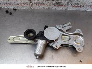 O154144 Gebruikte ruitmechaniek 4deurs rechts-achter Subaru Justy