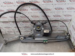 O154339 Gebruikte ruitmechaniek 2deurs links-voor Renault Clio