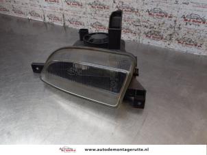 O154354 Gebruikte mistlamp links-voor Opel Zafira