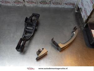 O154370 Gebruikte portiergreep 4deurs rechts-voor Ford Focus