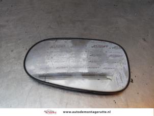 O154506 Gebruikte spiegelglas links Nissan Almera