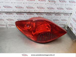O154859 Gebruikte achterlicht links Peugeot 207