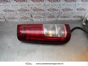 O154891 Gebruikte achterlicht links Suzuki Ignis