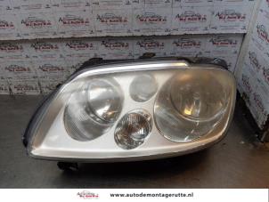 O155023 Gebruikte koplamp links Volkswagen Touran