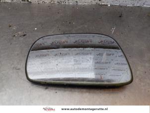 O155033 Gebruikte spiegelglas links Suzuki Wagon R+