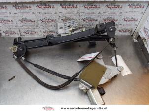 O155086 Gebruikte ruitmechaniek 2deurs links-voor Ford Street Ka