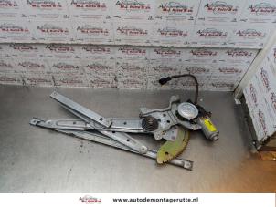 O155477 Gebruikte ruitmechaniek 4deurs rechts-achter Kia Carens