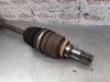 Gebruikte Aandrijfas links-voor Toyota Yaris O155881