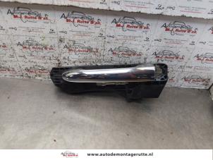 O156090 Gebruikte deurgreep 4deurs links-voor Lancia Delta