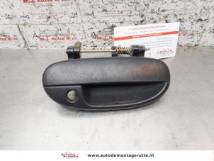 O157035 Gebruikte deurgreep 2deurs rechts Daewoo Lanos