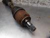 Gebruikte Aandrijfas links-voor Nissan Micra O157780