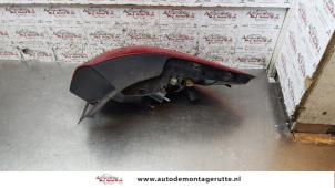 O158584 Gebruikte achterlicht links Opel Astra