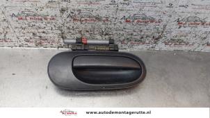 O159533 Gebruikte portiergreep 4deurs rechts-voor Nissan Almera Tino