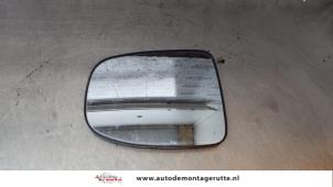 Gebruikte Spiegelglas links Daihatsu Cuore (L251/271/276) 1.0 12V DVVT Prijs op aanvraag aangeboden door Autodemontage M.J. Rutte B.V.