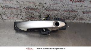 O160135 Gebruikte portiergreep 4deurs links-voor Ford Fiesta