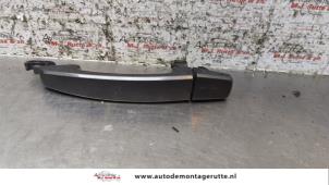 O160328 Gebruikte portiergreep 4deurs links-achter Opel Astra