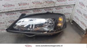 O160427 Gebruikte linker koplamp Opel Astra