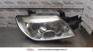 O160457 Gebruikte rechter koplamp Mitsubishi Outlander